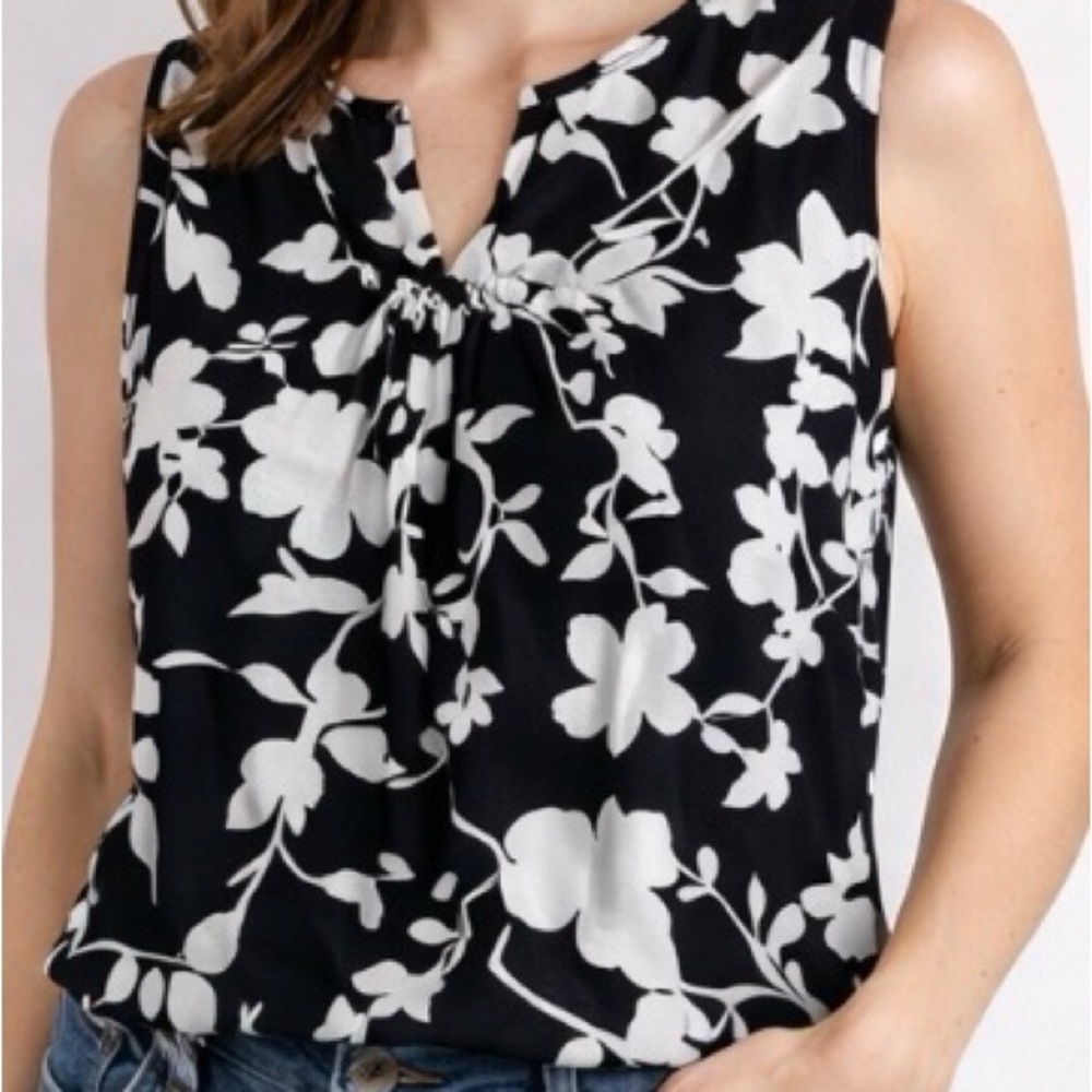 WBHM brand white black floral sleeve less top size medium cotton spandex & rayon